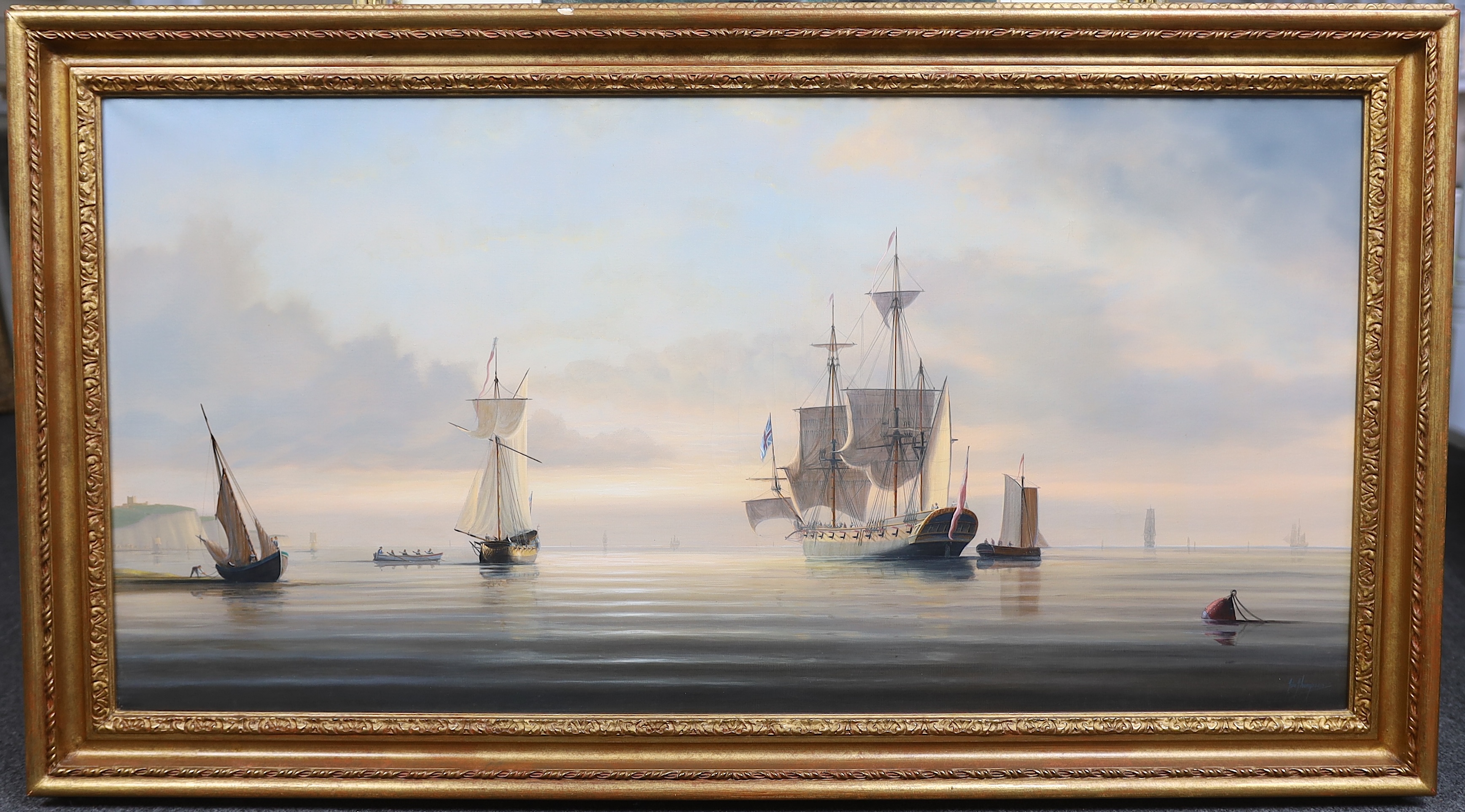 Timothy Franklin Ross Thompson (English, b.1951), English naval ship and other shipping off the Sussex coast, on a calm sea, oil on canvas, 50 x 100cm